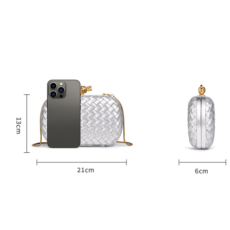 THE REFINED BARREL DUFFEL CLUTCH